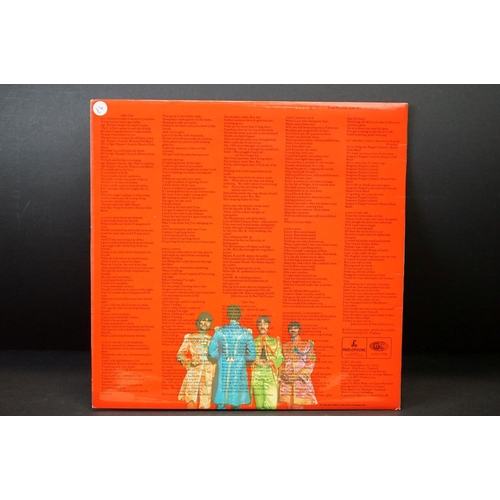 352 - Vinyl - 2 stereo copies of The Beatles Sgt Pepper (PCS 7027).  Two boxed EMI black & silver label re... 