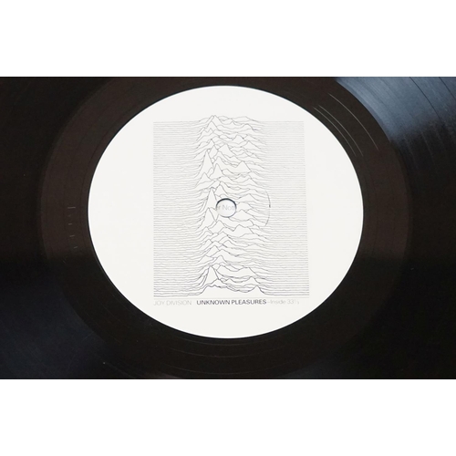 55 - Vinyl - Joy Division Unknown Pleasures on Factory FACT 10.  Textured sleeve Vg+, Vinyl has light hai... 