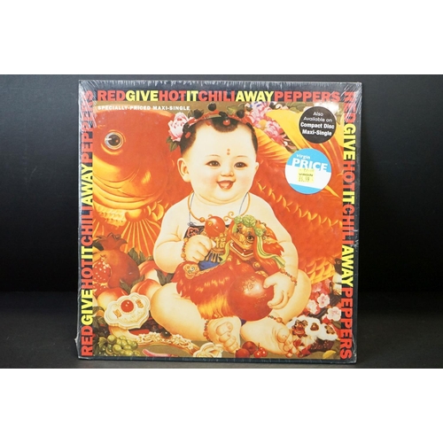 580 - Vinyl - Red Hot Chili Peppers What Hits? LP on EMI (0777 7 94762 1 3) Vg, along with a sealed Give I... 