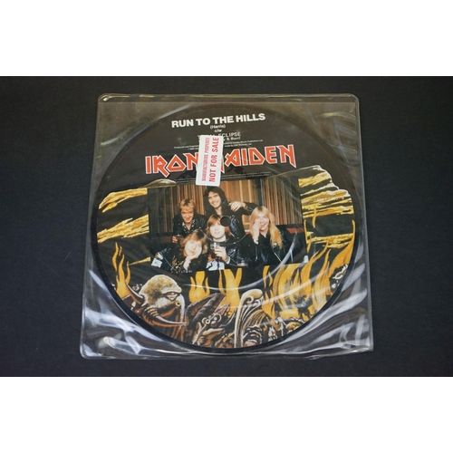 33 - Vinyl - 4 Iron Maiden picture discs / shaped discs to include: The Number Of The Beast (album P/D, f... 