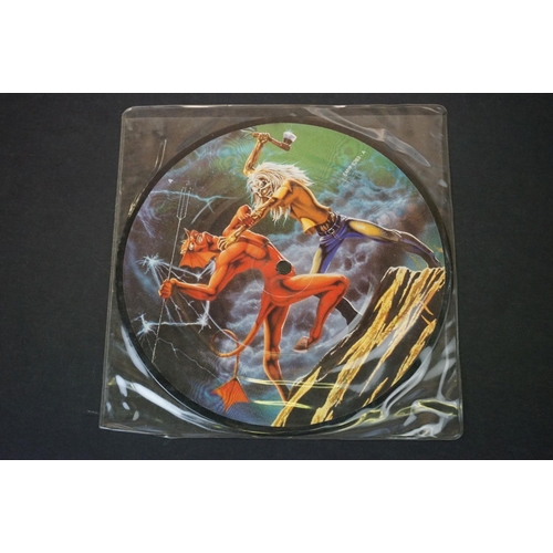 33 - Vinyl - 4 Iron Maiden picture discs / shaped discs to include: The Number Of The Beast (album P/D, f... 