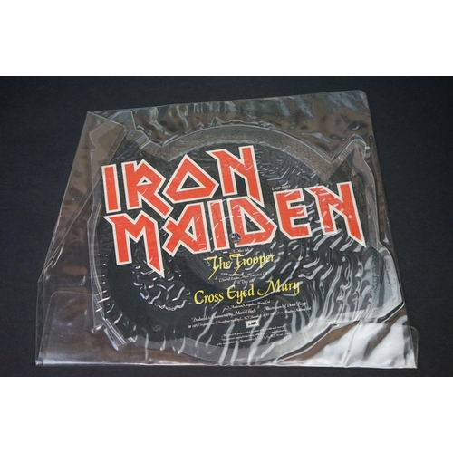 33 - Vinyl - 4 Iron Maiden picture discs / shaped discs to include: The Number Of The Beast (album P/D, f... 