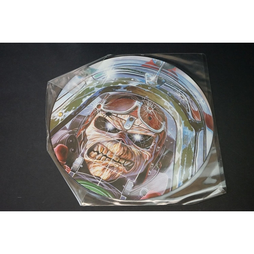 33 - Vinyl - 4 Iron Maiden picture discs / shaped discs to include: The Number Of The Beast (album P/D, f... 