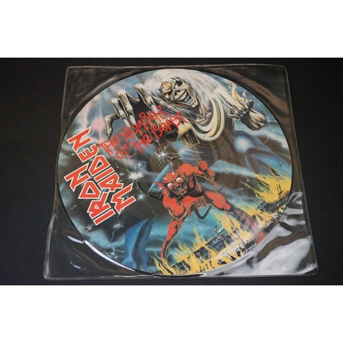 33 - Vinyl - 4 Iron Maiden picture discs / shaped discs to include: The Number Of The Beast (album P/D, f... 