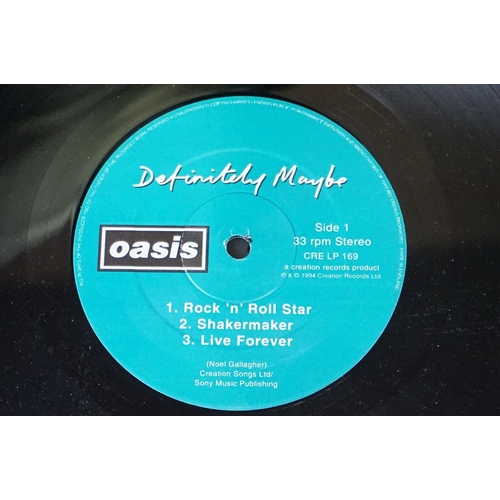 543 - Vinyl - 2 Original pressing Oasis LPs to include Definitely Maybe (CRELP169) Vg, and What's The Stor... 