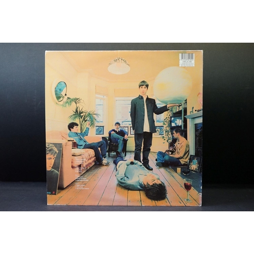 543 - Vinyl - 2 Original pressing Oasis LPs to include Definitely Maybe (CRELP169) Vg, and What's The Stor... 