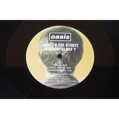 543 - Vinyl - 2 Original pressing Oasis LPs to include Definitely Maybe (CRELP169) Vg, and What's The Stor... 