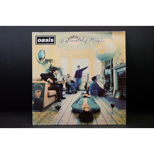 543 - Vinyl - 2 Original pressing Oasis LPs to include Definitely Maybe (CRELP169) Vg, and What's The Stor... 