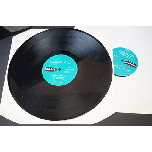 543 - Vinyl - 2 Original pressing Oasis LPs to include Definitely Maybe (CRELP169) Vg, and What's The Stor... 