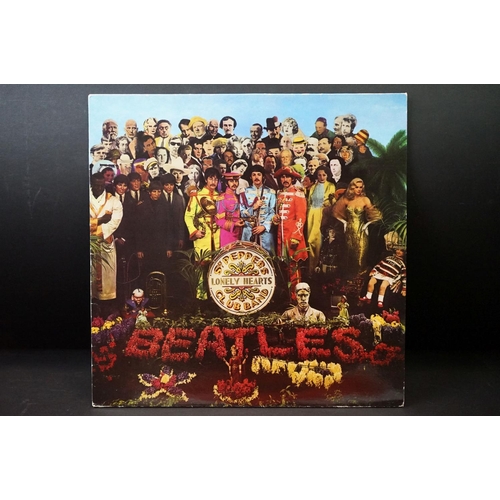 377 - Vinyl - 3 pictured / colour pressings of The Beatles Sgt Pepper to include Australian red vinyl, Can... 