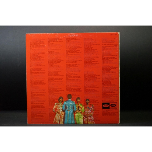 377 - Vinyl - 3 pictured / colour pressings of The Beatles Sgt Pepper to include Australian red vinyl, Can... 