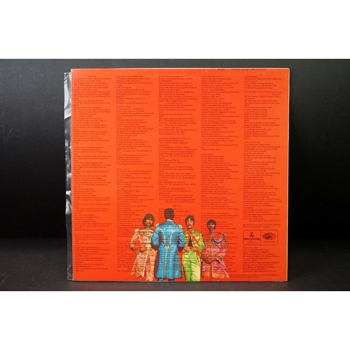 377 - Vinyl - 3 pictured / colour pressings of The Beatles Sgt Pepper to include Australian red vinyl, Can... 