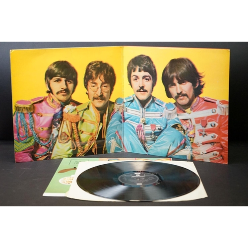 379 - Vinyl - 3 stereo copies of The Beatles Sgt Pepper (PCS 7027) rereleases.  All with inserts.  Vg