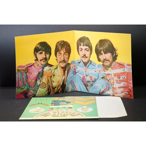 379 - Vinyl - 3 stereo copies of The Beatles Sgt Pepper (PCS 7027) rereleases.  All with inserts.  Vg