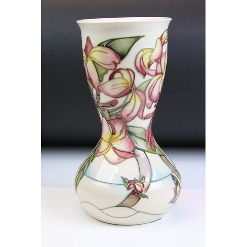 7 - 20th Century Moorcroft waisted vase having tube lined floral detailing upon a cream ground. Impresse... 