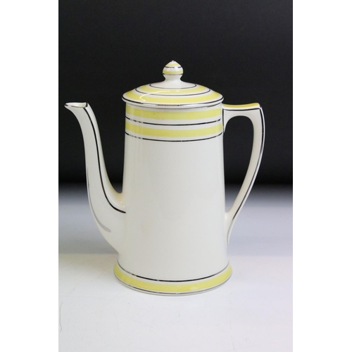 30 - Art Deco Crown Ducal coffee set having a yellow striped design with silver gilt details. To include ... 