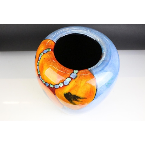 41 - Poole Pottery - Wild Poppy - A drip glaze vase having a blue ground with an orange floral spray to t... 