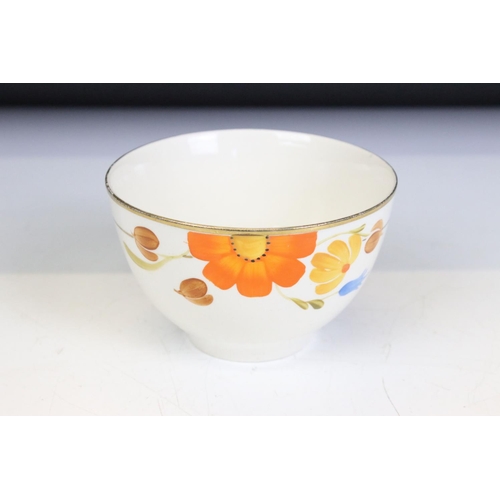 42 - Art Deco Gray's Pottery dinner service having hand painted orange and blue floral decoration. To inc... 