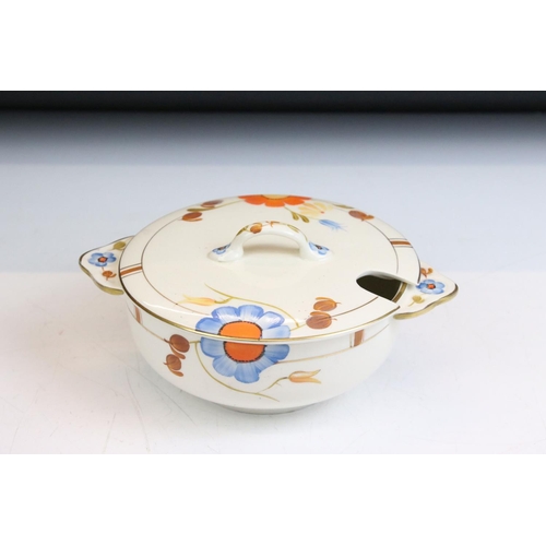 42 - Art Deco Gray's Pottery dinner service having hand painted orange and blue floral decoration. To inc... 