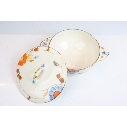 42 - Art Deco Gray's Pottery dinner service having hand painted orange and blue floral decoration. To inc... 