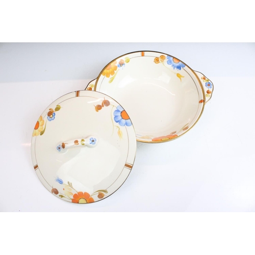 42 - Art Deco Gray's Pottery dinner service having hand painted orange and blue floral decoration. To inc... 