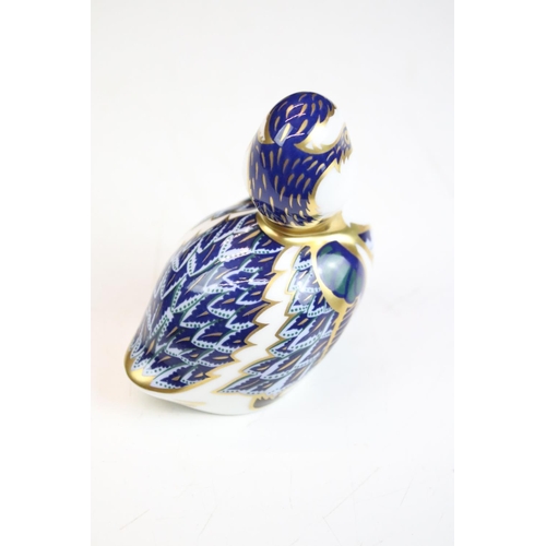 55 - Group of three Royal Crown Derby ceramic paperweights to include two birds with gold stoppers and on... 