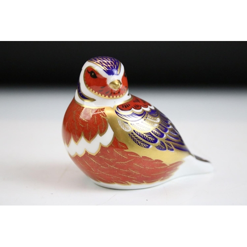 55 - Group of three Royal Crown Derby ceramic paperweights to include two birds with gold stoppers and on... 