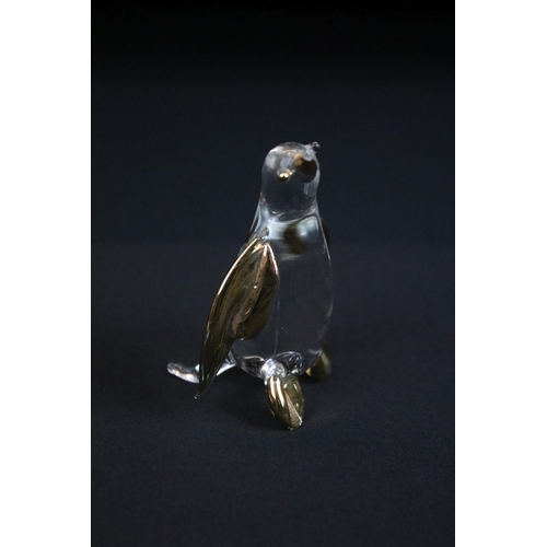 65 - Group of Swarovski crystal animals to include two mice, a cat, a hedgehog and a swan all marked Swar... 