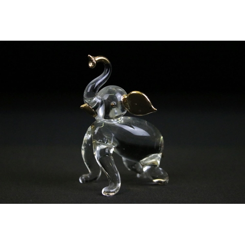 65 - Group of Swarovski crystal animals to include two mice, a cat, a hedgehog and a swan all marked Swar... 