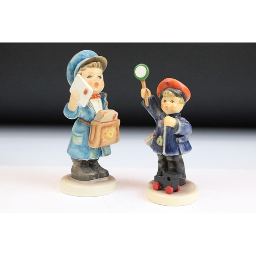 66 - Fourteen Hummel Goebel figurines to include a postman, boy with lamb, flute player etc. Tallest meas... 