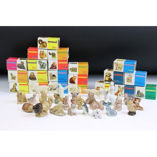 67 - Collection of mid Century Wade Whimsies including some in their original boxes. Approximately 43 in ... 