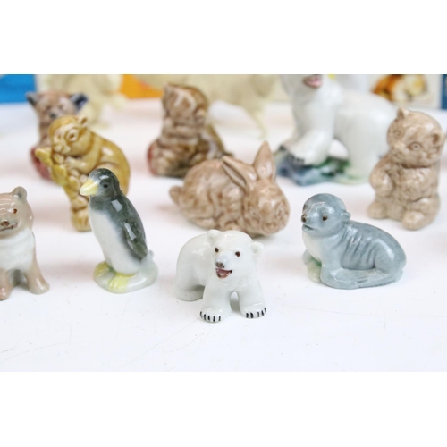 67 - Collection of mid Century Wade Whimsies including some in their original boxes. Approximately 43 in ... 