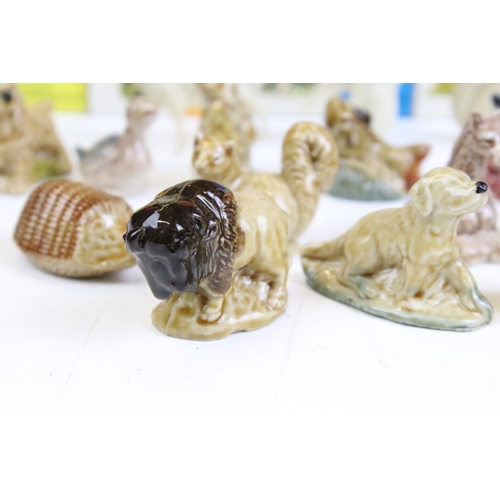 67 - Collection of mid Century Wade Whimsies including some in their original boxes. Approximately 43 in ... 