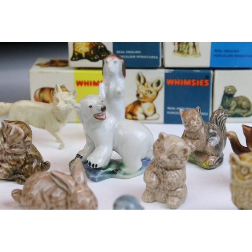 67 - Collection of mid Century Wade Whimsies including some in their original boxes. Approximately 43 in ... 