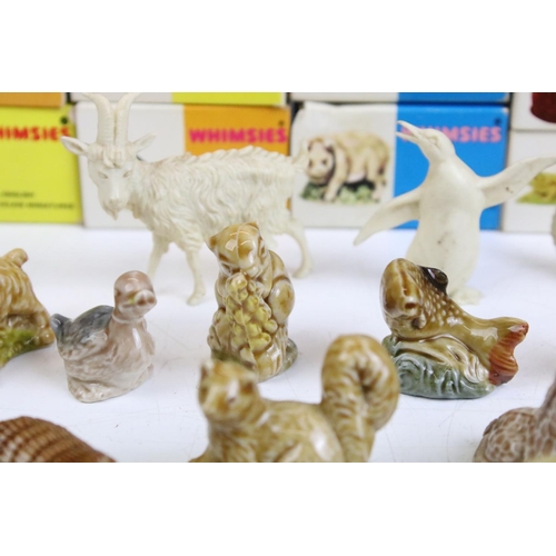 67 - Collection of mid Century Wade Whimsies including some in their original boxes. Approximately 43 in ... 