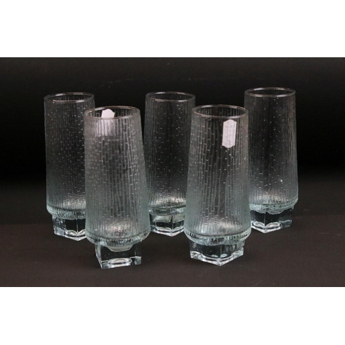 72 - Set of five mid Century Tapio Wirkkala long glasses having moulded textured sides together with thre... 