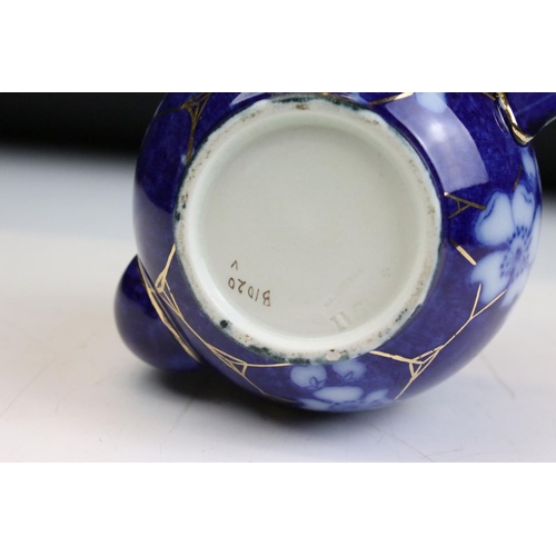 73 - 19th Century Victorian Macintyre tea set decorated with blue and white florals and gilt detailing. T... 