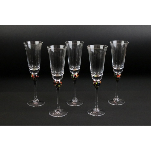 80 - Murano glass decanter and glass set to include five glasses with mottled coloured glass knops to the... 