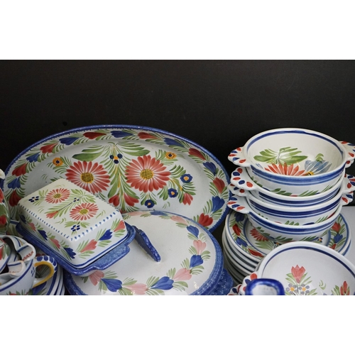 110 - Large French Quimper faience dinner service having a white ground hand painted with floral sprays. T... 