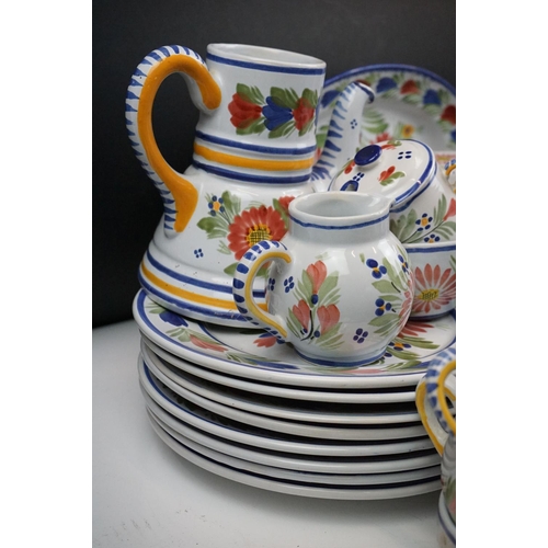 110 - Large French Quimper faience dinner service having a white ground hand painted with floral sprays. T... 