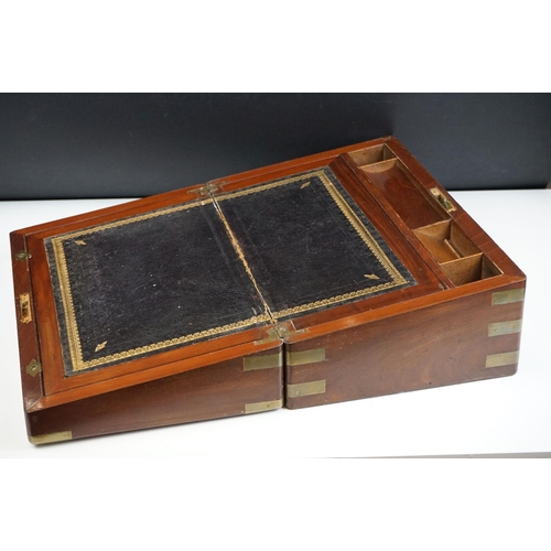 123 - 19th Century Victorian mahogany writing slope having brass banded detailing and a tooled blue leathe... 