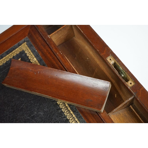 123 - 19th Century Victorian mahogany writing slope having brass banded detailing and a tooled blue leathe... 