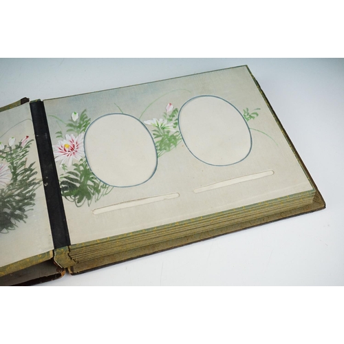 124 - Early 20th Century Japanese lacquer photograph / postcard album having applied mother of pearl figur... 