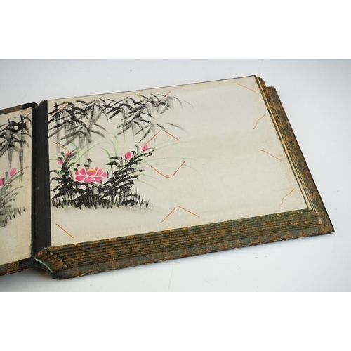 125 - Early 20th Century Japanese lacquer photograph / postcard album featuring a gilt landscape scene to ... 