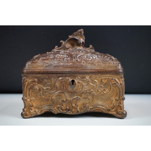 145 - 19th century Metal Jewellery Casket in the Rococo manner with foliate scroll casting, the hinged lid... 