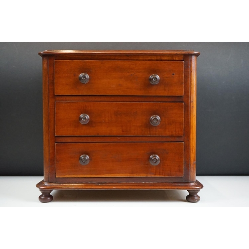 151 - Victorian mahogany table top three drawer chest