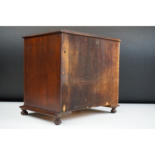 151 - Victorian mahogany table top three drawer chest