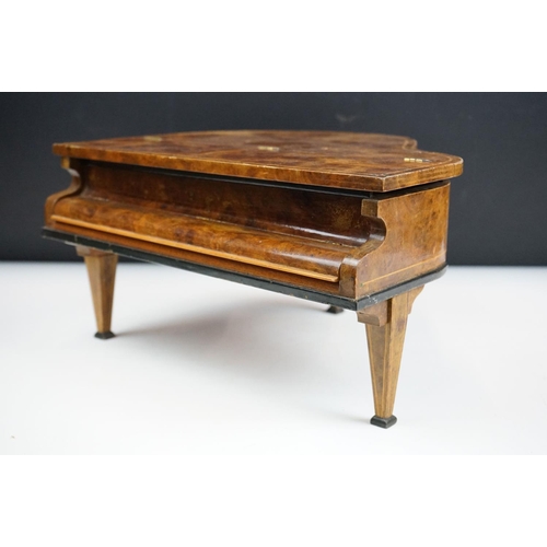 164 - Mid Century walnut music box in the form of a piano. The box having compartment to the front with pa... 