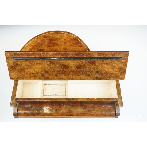 164 - Mid Century walnut music box in the form of a piano. The box having compartment to the front with pa... 