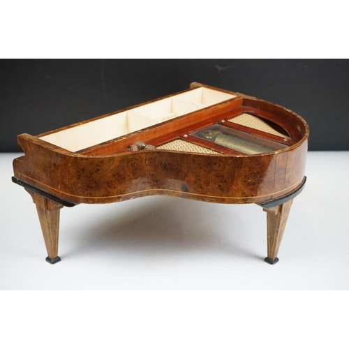 164 - Mid Century walnut music box in the form of a piano. The box having compartment to the front with pa... 